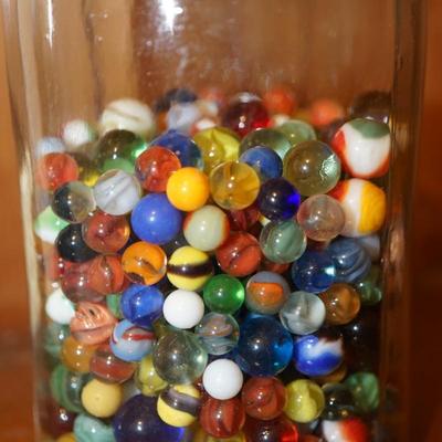 GLASS CONTAINER OF VINTAGE MARBLES UNSORTED