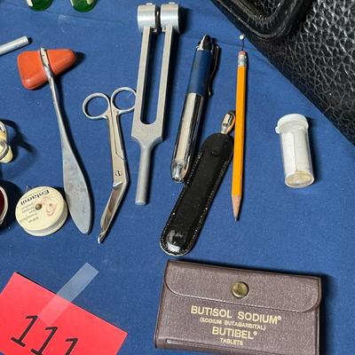 Antique doctor bag with vintage items