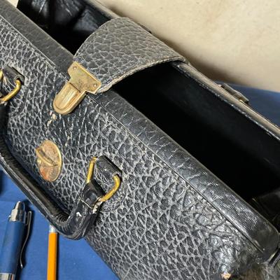 Antique doctor bag with vintage items