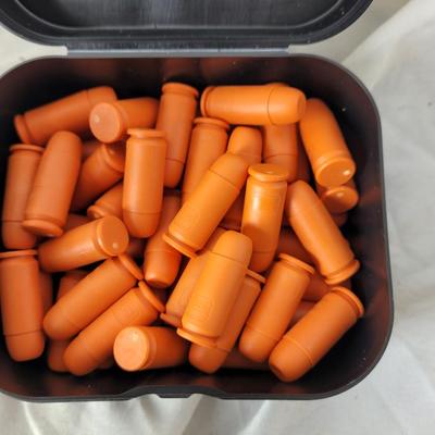 Two boxes of 12 guage dummy loads and another box of plastic bullets