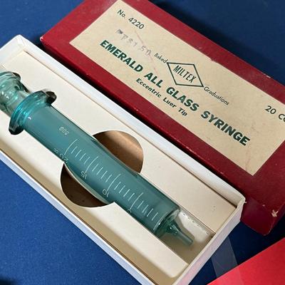 Antique glass syringes