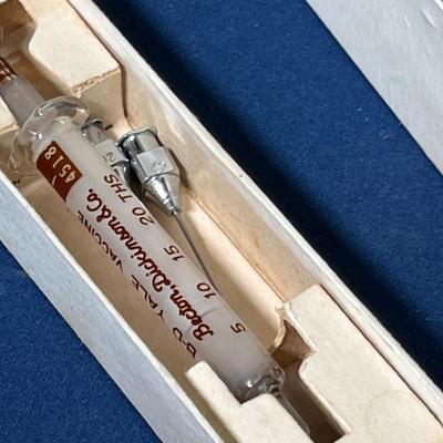 Antique glass syringes