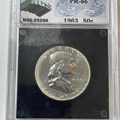 NGS CERTIFIED 1963 PR-66 GRADED FRANKLIN SILVER HALF DOLLAR AS PICTURED.