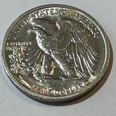 1942-S Brilliant Uncirculated Condition Walking Liberty Silver Half Dollar as Pictured.