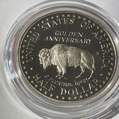 1991-S PROOF MOUNT RUSHMORE HALF DOLLAR IN A MINT HOLDER AS PICTURED.