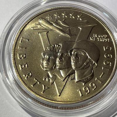 1993-P (1991-1995) 50th Anniversary of World War II Clad Half Dollar in a Mint Holder as Pictured.