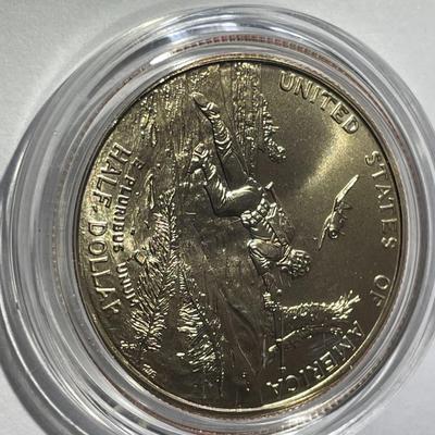 1993-P (1991-1995) 50th Anniversary of World War II Clad Half Dollar in a Mint Holder as Pictured.