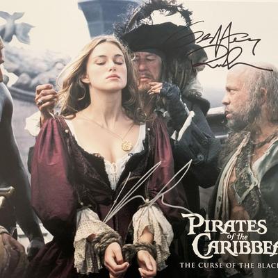 Pirates of the Caribbean: The Curse of the Black Pearl Geoffrey Rush and Keira Knightleysigned movie photo