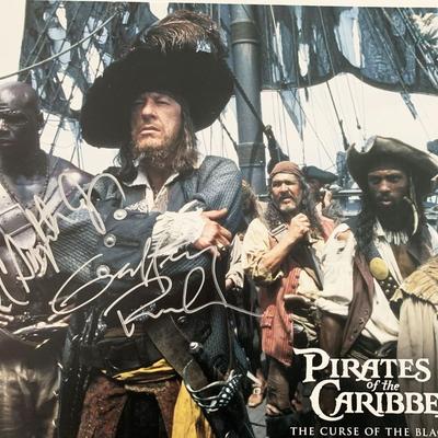 Pirates of the Caribbean: The Curse of the Black Pearl Geoffrey Rush and Isaac C. Singleton Jr. signed lobby card
. GFA Authenticated