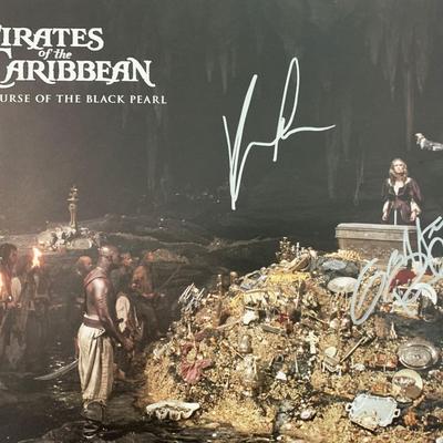 Pirates of the Caribbean: The Curse of the Black Pearl Geoffrey Rush and Keira Knightley signed lobby card. GFA Authenticated