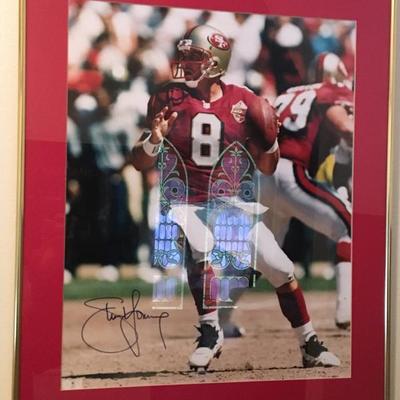 49ers STEVE YOUNG HAND-SIGNED 16 X 20 ACTION  PHOTOGRAPH w/COA 