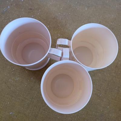 3 cream mugs