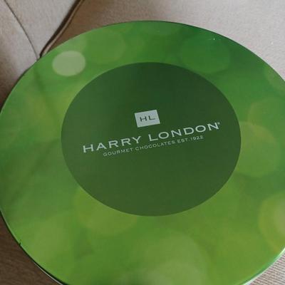 tin of xmas bulbs harry of london
