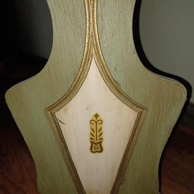 green wooden magazine stand