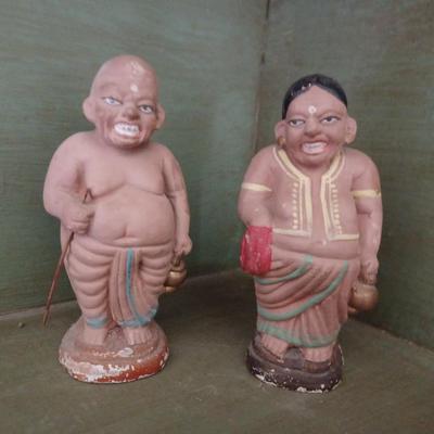 2 ceramic Buddha figurines