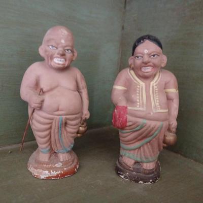 2 ceramic Buddha figurines
