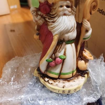3 santa through the ages