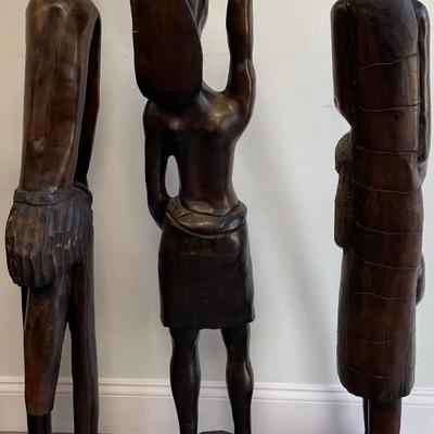 Three Tall Robust Wood African Statues