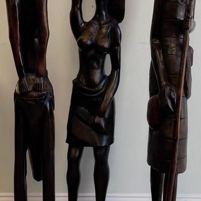 Three Tall Robust Wood African Statues