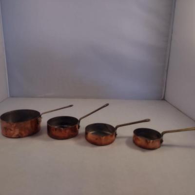 Set of Four Graduated Copper Measuring Cups