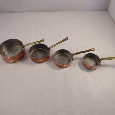 Set of Four Graduated Copper Measuring Cups