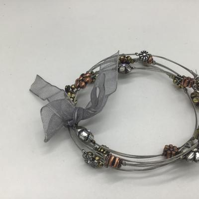 Set of three flower bracelets