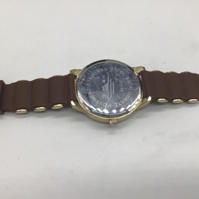 Geneva gold and brown wristwatch