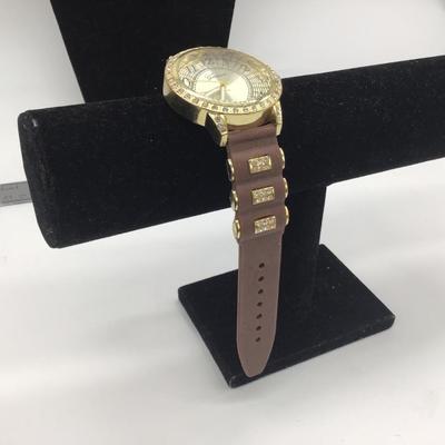 Geneva gold and brown wristwatch