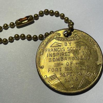 Vintage Brass Fort McHenry Fob/Keychain Star Spangled Banner Francis Scott Key Baltimore MD in Good Preowned Condition.