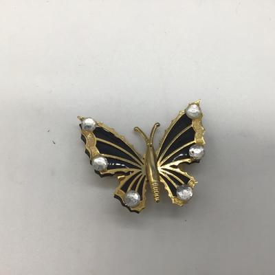 Gold and black butterfly pin