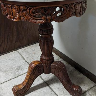 Stone Top and Hand Carved Base Parlor Table