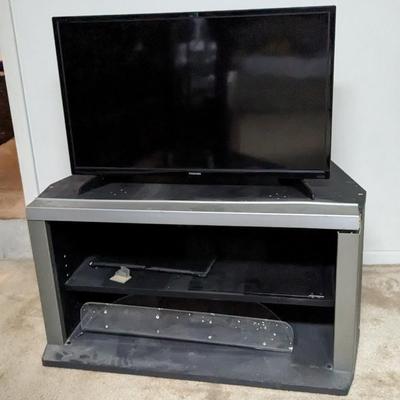 Toshiba Fire TV with Stand and Samsung TV