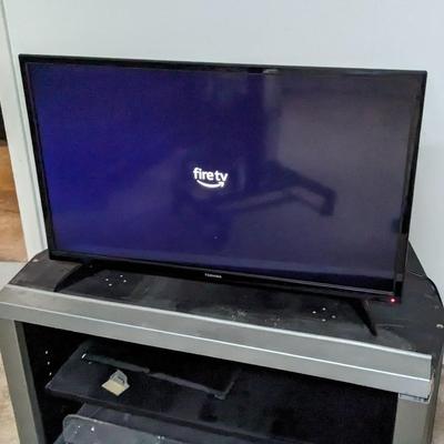 Toshiba Fire TV with Stand and Samsung TV