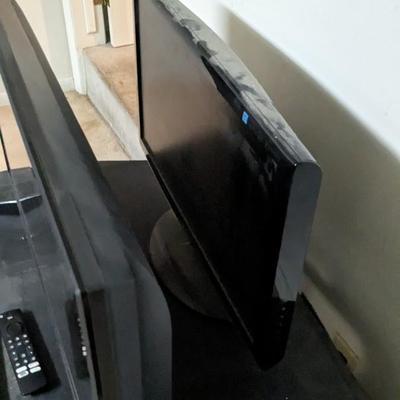 Toshiba Fire TV with Stand and Samsung TV