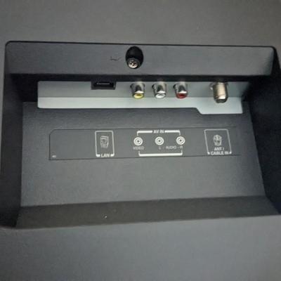 Toshiba Fire TV with Stand and Samsung TV