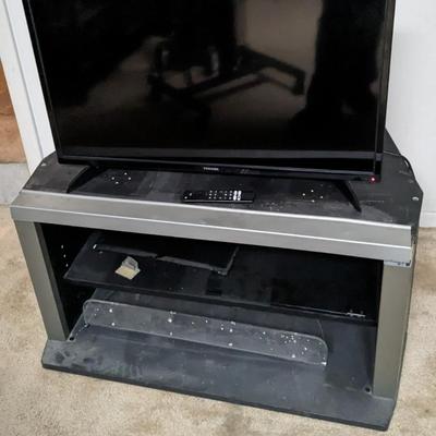Toshiba Fire TV with Stand and Samsung TV