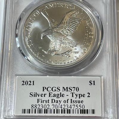 PCGS CERTIFIED 2021 TYPE-2 REVERSE MS-70 FIRST DAY ISSUE AMERICAN SILVER EAGLE 1-OZ .999 AS PICTURED. (SIGNED BY JIM PEED DESIGNER).