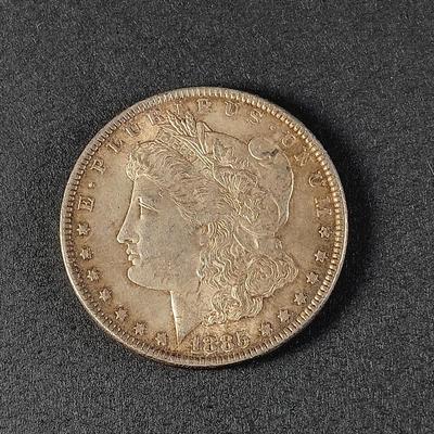 LOT 15: 1885 Morgan Silver Dollar Coin