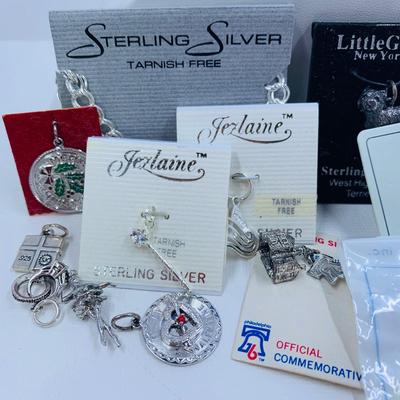 LOT 58: Sterling Silver Charm Bracelet, 10 Sterling Silver Charms & More