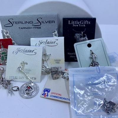 LOT 58: Sterling Silver Charm Bracelet, 10 Sterling Silver Charms & More