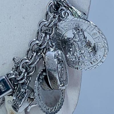 LOT 60: Elco Sterling Silver Charm Bracelet & Sterling Charms
