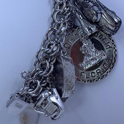 LOT 60: Elco Sterling Silver Charm Bracelet & Sterling Charms