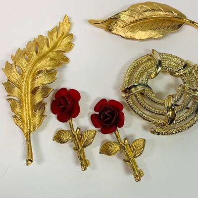 LOT 71: Vintage Gold Tone Fashion Brooches: Coro, Avon & More