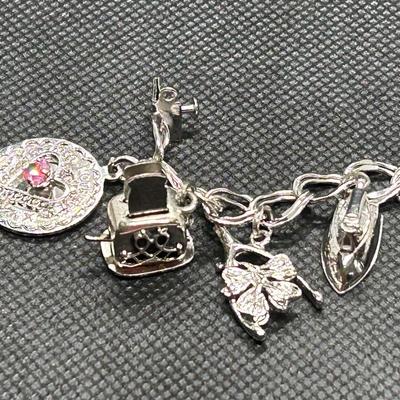 LOT 89: Sterling Silver Charm Bracelet & Charms
