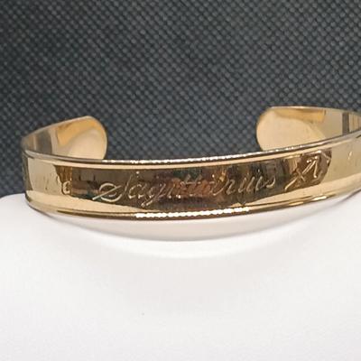 LOT 106: Collection of Vintage Gold-Tone Bracelets