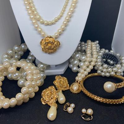 LOT:112: Large Selection of Faux Pearl Jewelry - Braclet, Necklaces, and Clip-on Earrings.