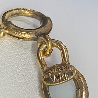 LOT 127: Moonstone Linked Bracelet: 1/20 12k Gold: Marked WRE