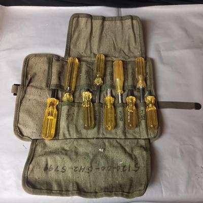 SET OF NUT DRIVERS IN A MILITARY CANVAS TOOL ROLL