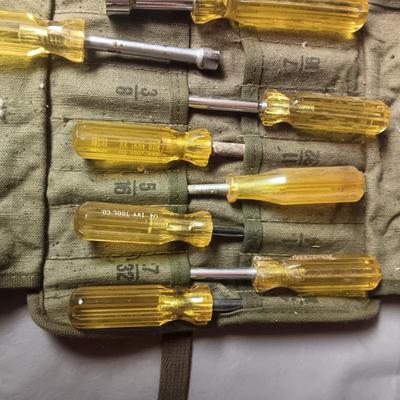 SET OF NUT DRIVERS IN A MILITARY CANVAS TOOL ROLL