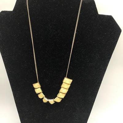 Unique golden toned necklace